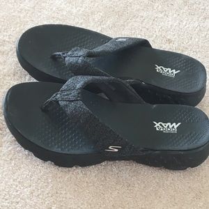 grey flip flops